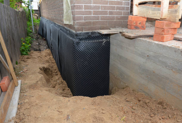 SJ Waterproofing Pros technician performing targeted Foundation Crack Repair assessment in Holland, NY